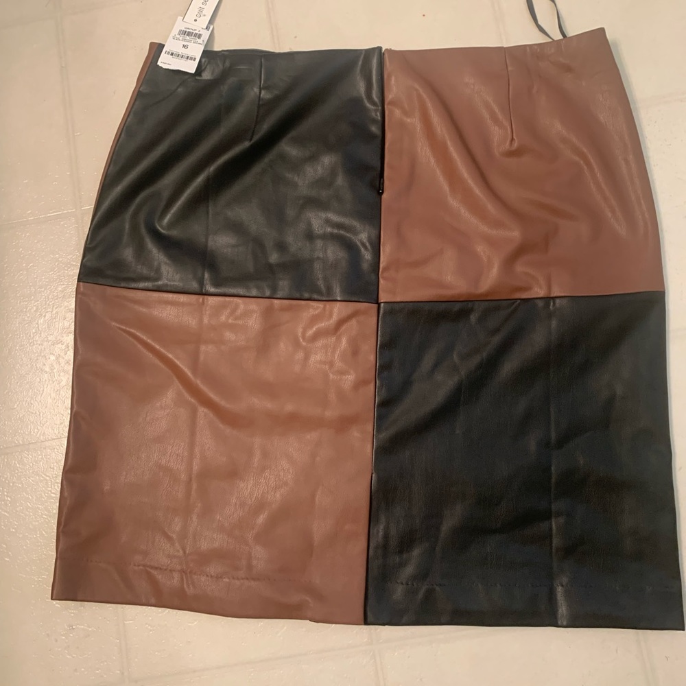 New with tags. Ladies faux leather skirt